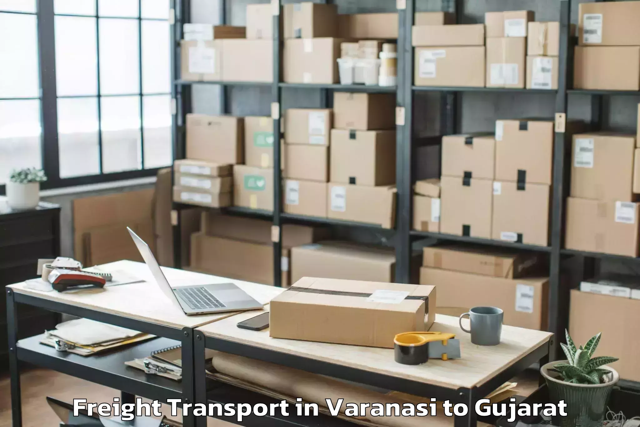 Get Varanasi to Hansot Freight Transport